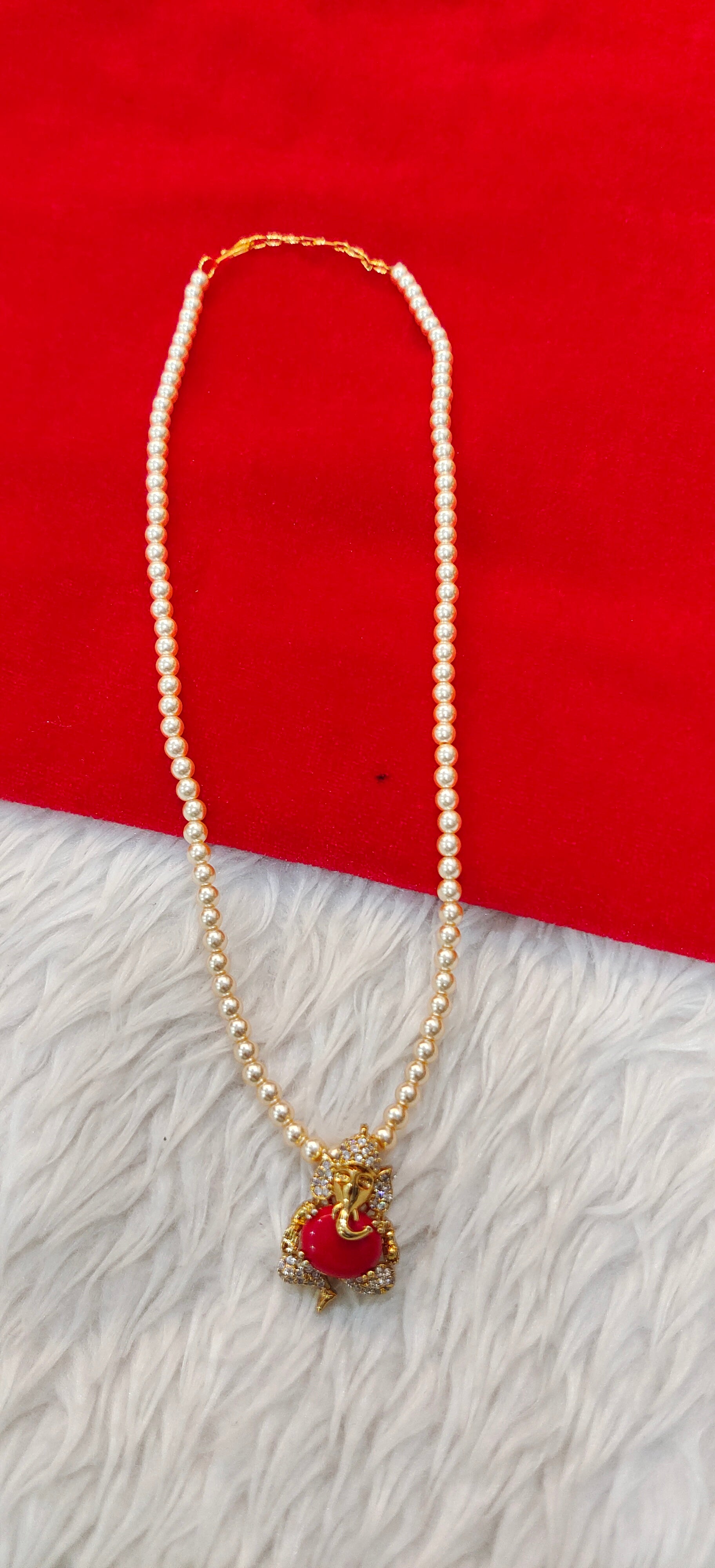 Original Swaroski pearls with ganesh locket