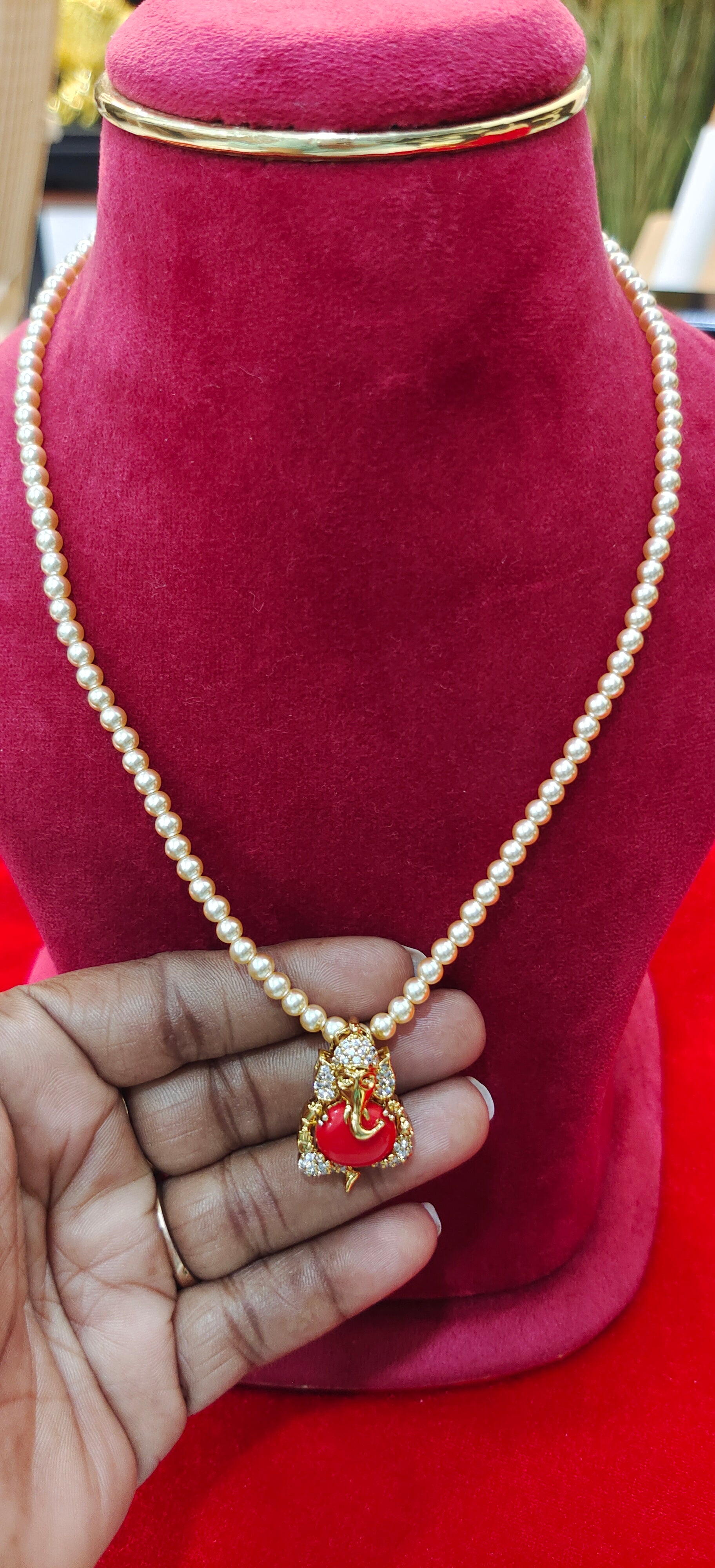 Original Swaroski pearls with ganesh locket