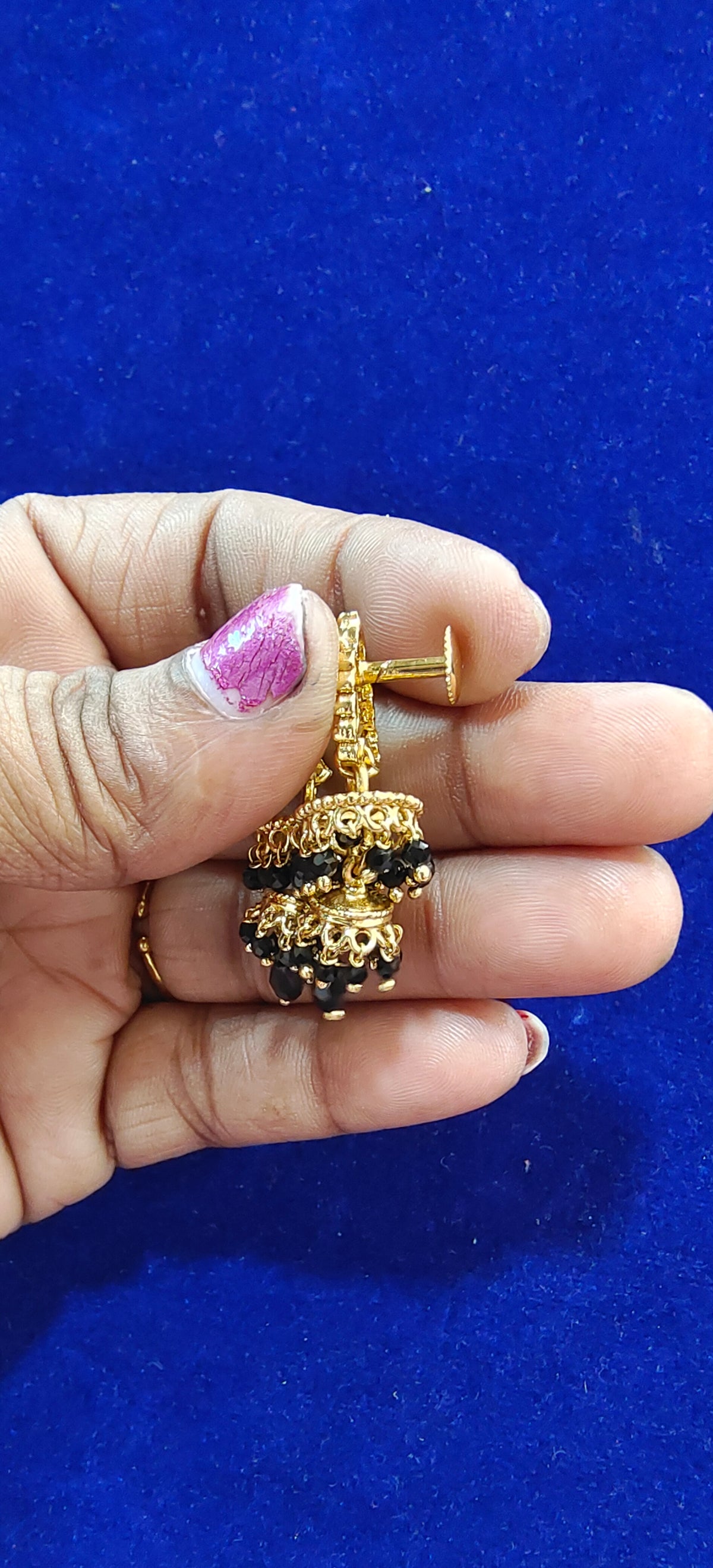 Traditional gold look buttalu