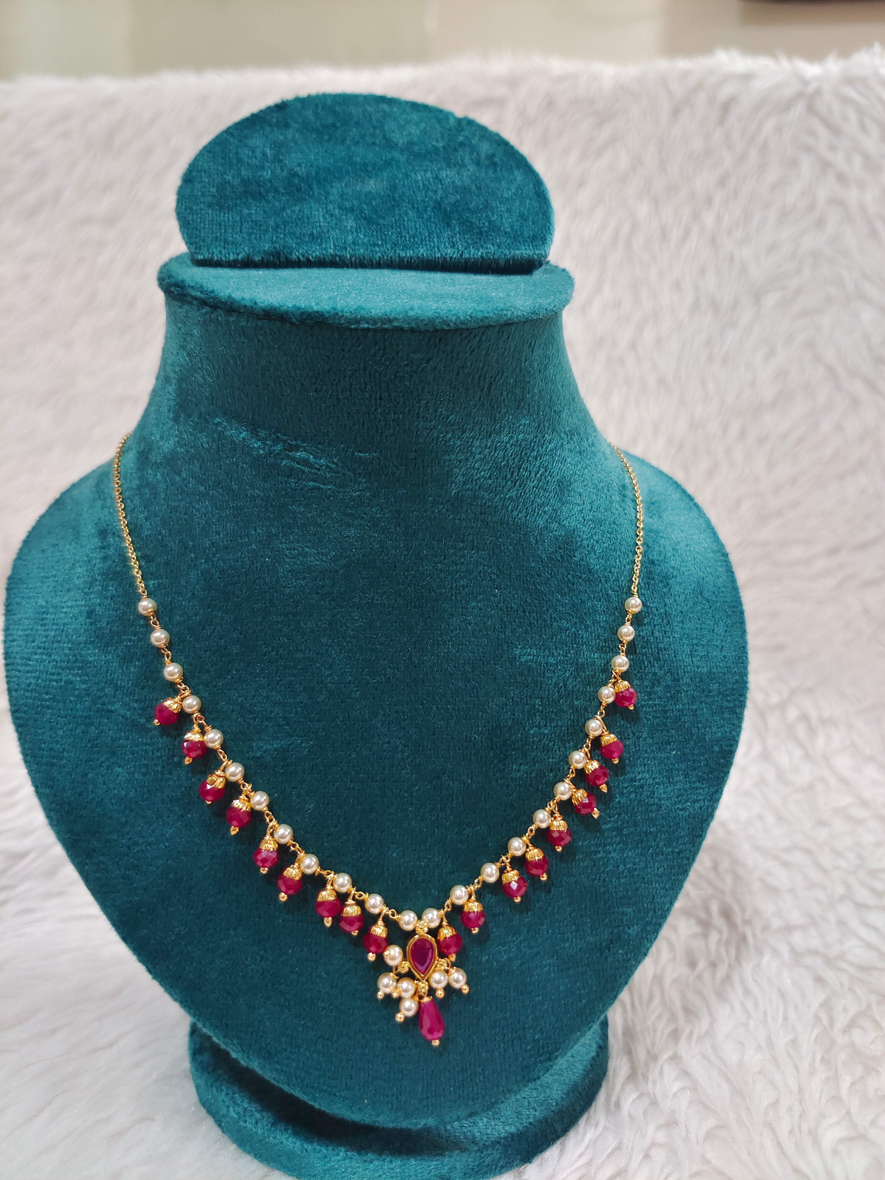Our own handmade design with swaroski pearl and rubys neck chain