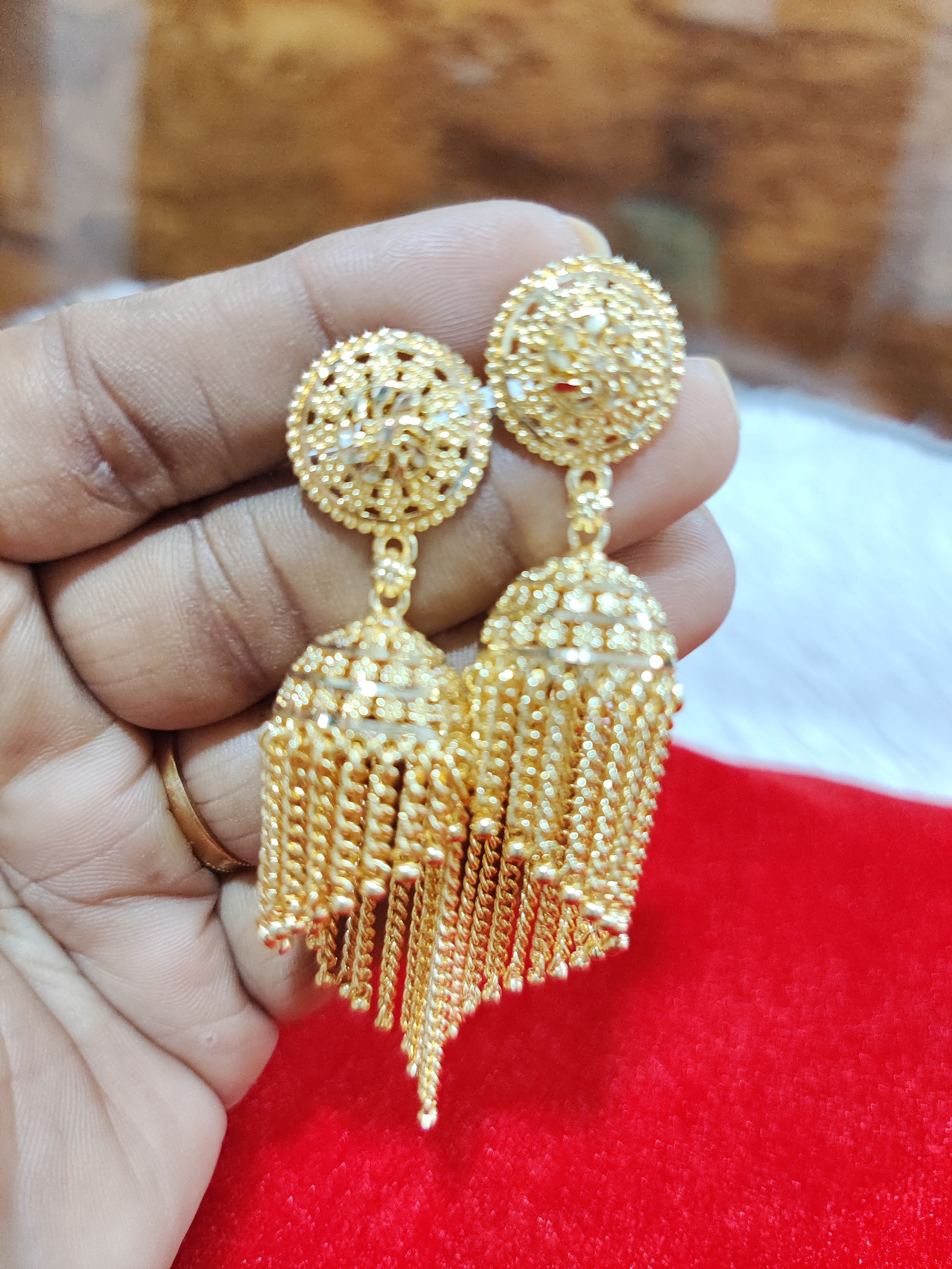 Panchaloham foaming gold polish Buttalu with screw back.