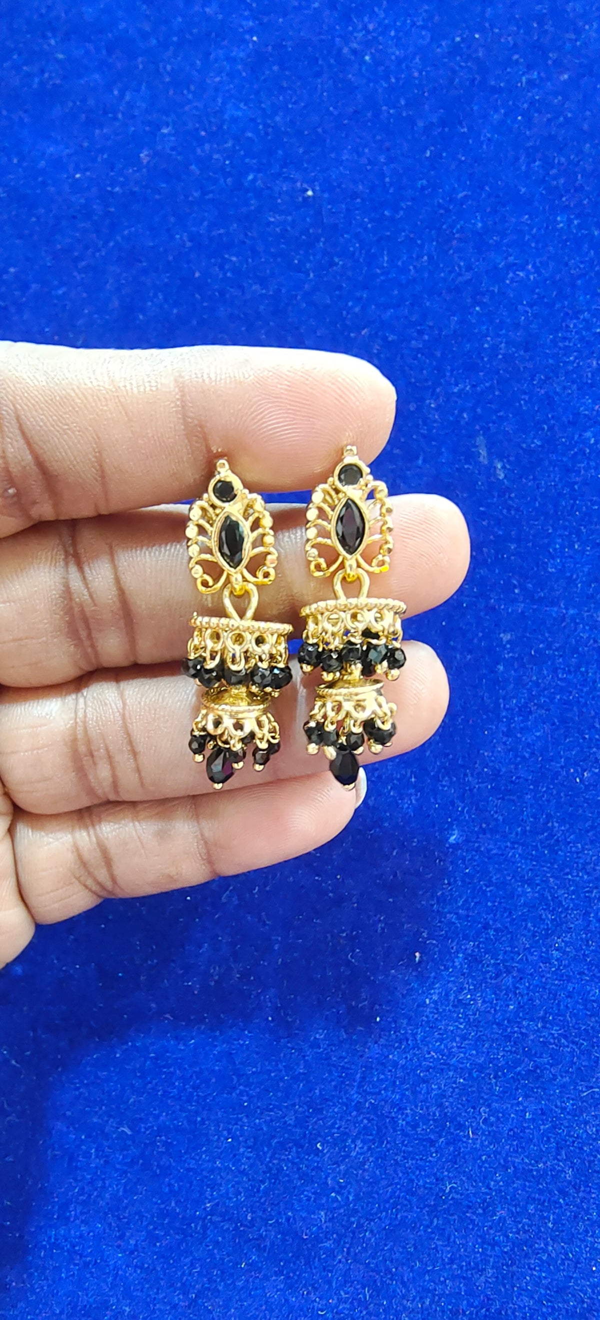Traditional gold look buttalu