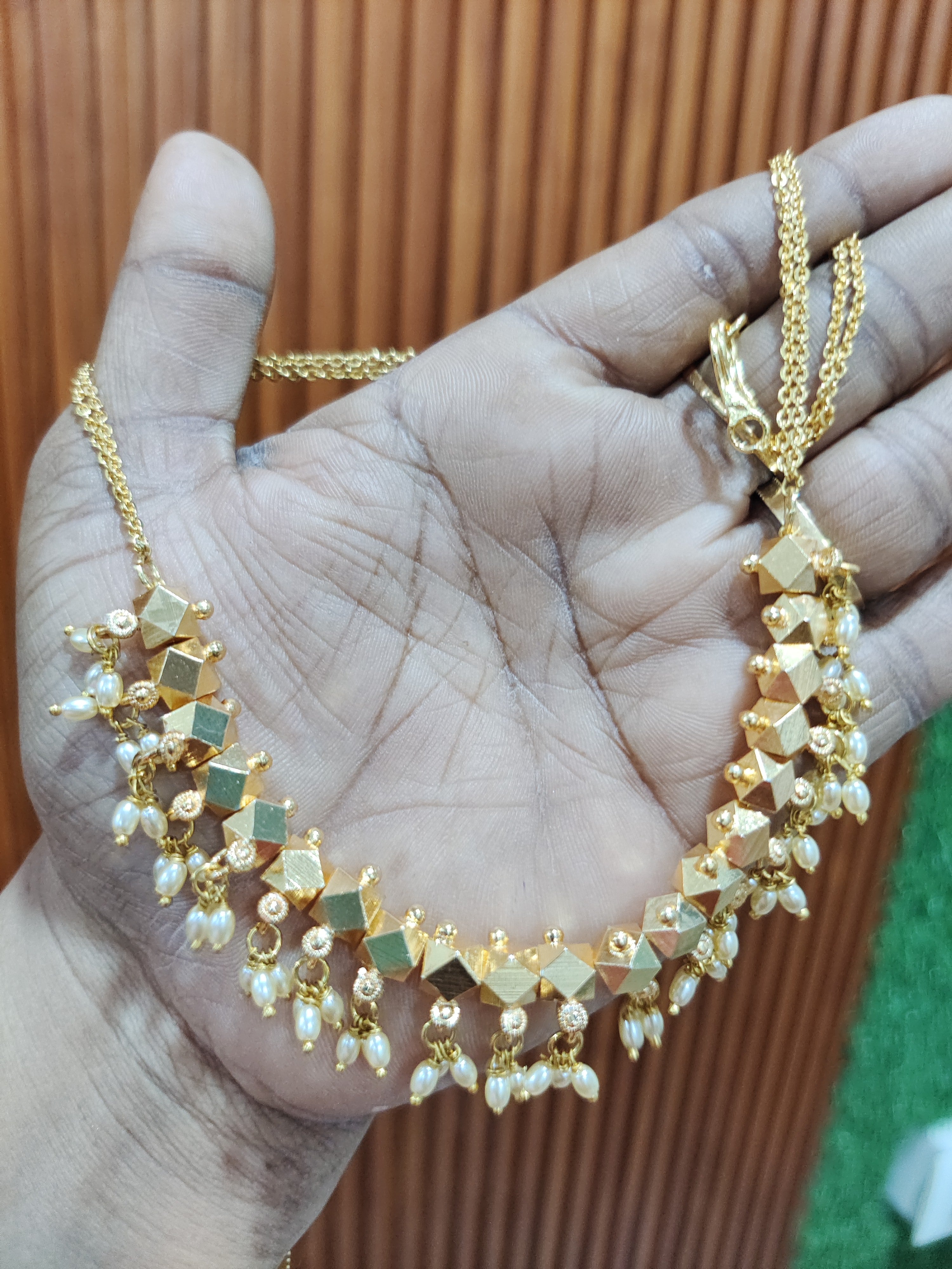 Panchaloham palakasaralu neck set with rice pearls hangings